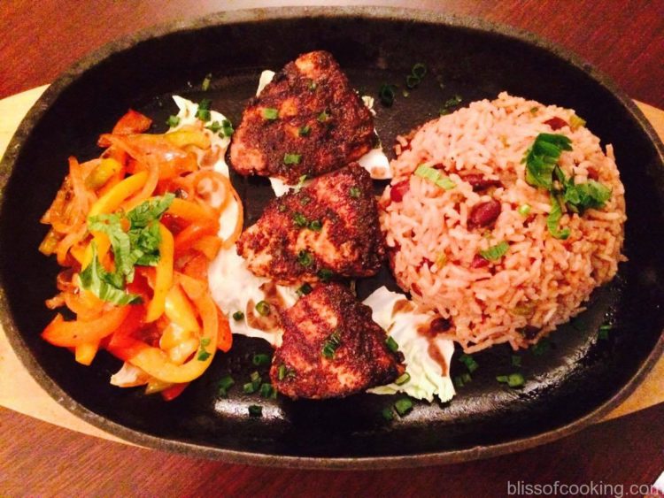Sizzling Jamaican Platter with cottage cheese and Jamaican rice